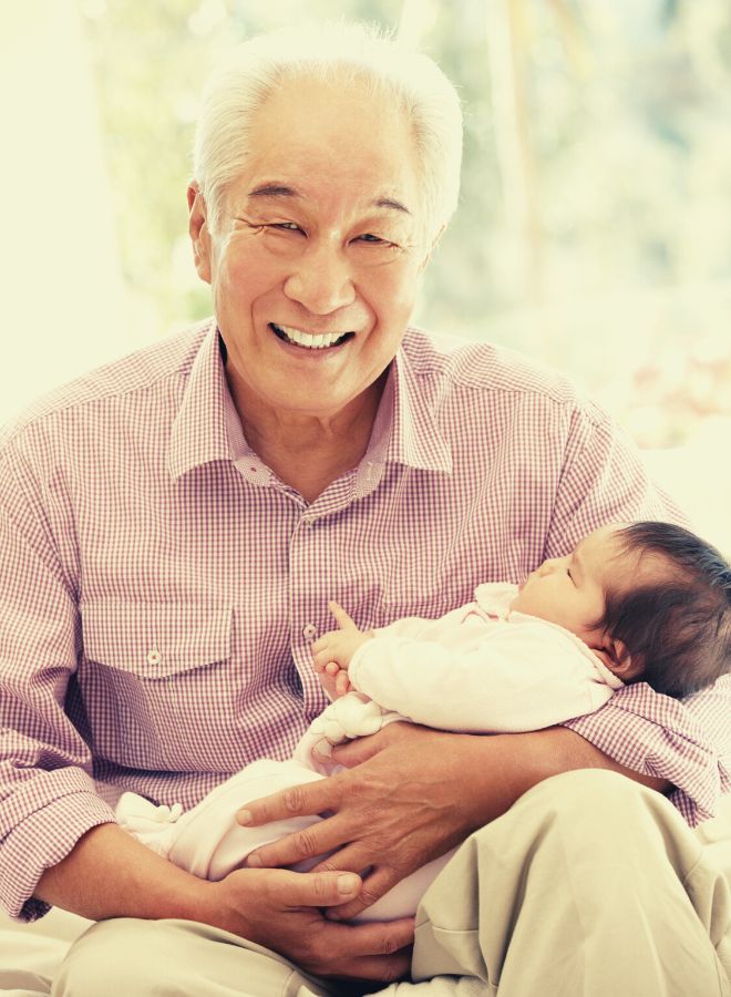 Deceased Loved One Holding a Baby and Smiling in dream